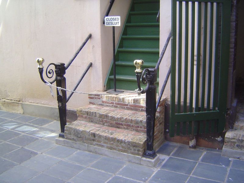 Slave-quarters were upstairs in the back and over a stable. Presumably one of their tasks was polishing these hitching posts.