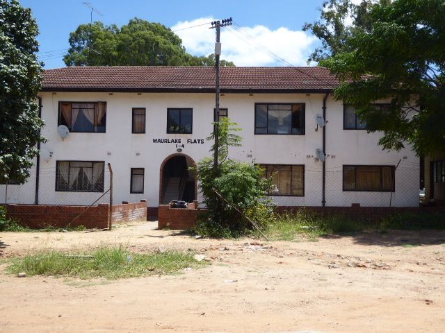 A late-colonial apartment block.