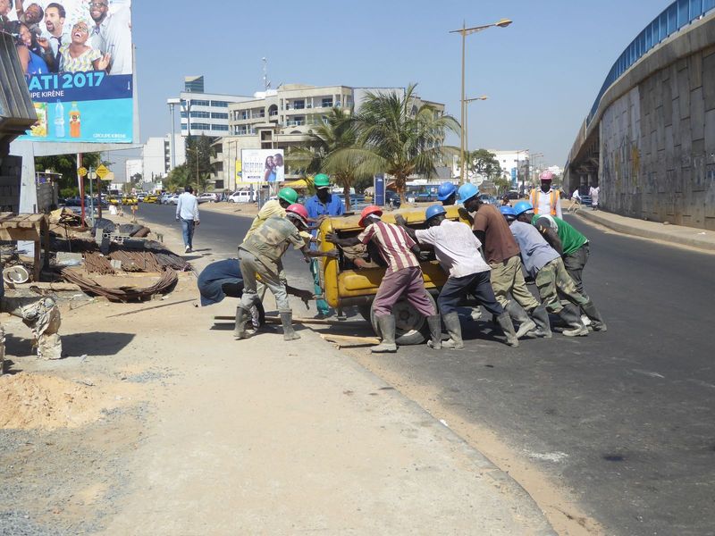 Meanwhile, construction crews do things the hard way.
