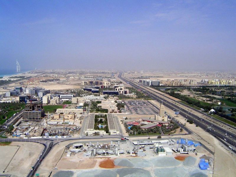 Looking to the eastern horizon, with the Sheikh Zayed highway on the right and in the distant left the iconic Burj Al Arab. Dubai proper is 