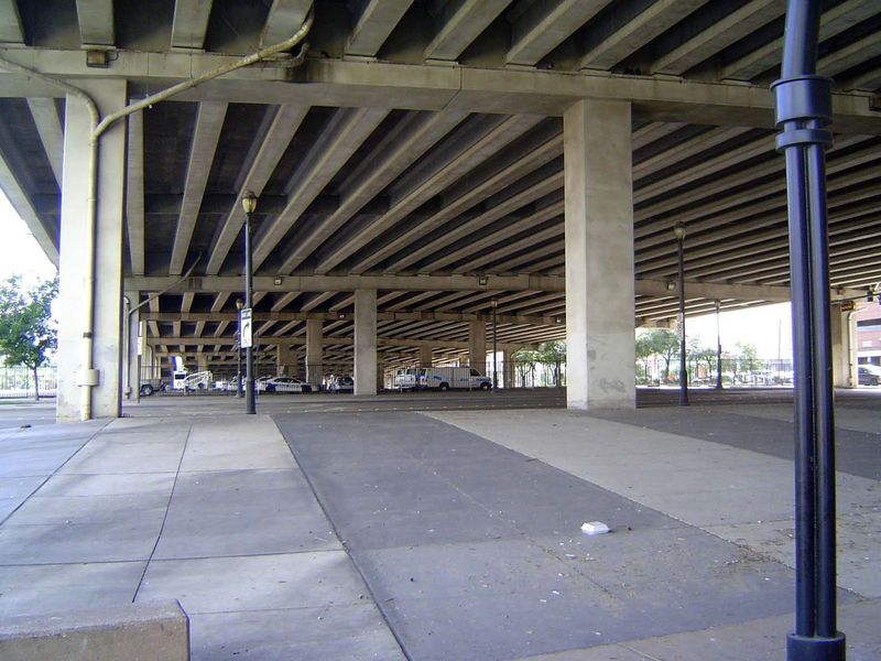 Downtown is to the right; Uptown is to the left. To its credit, the city has now built a 5-acre park that roofs this freeway and provides an