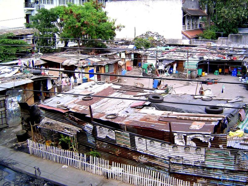 More authentic: a shantytown seen from a Casa Manila window. Washington SyCip put it well: the Philippines had "a thin layer of rich and suc