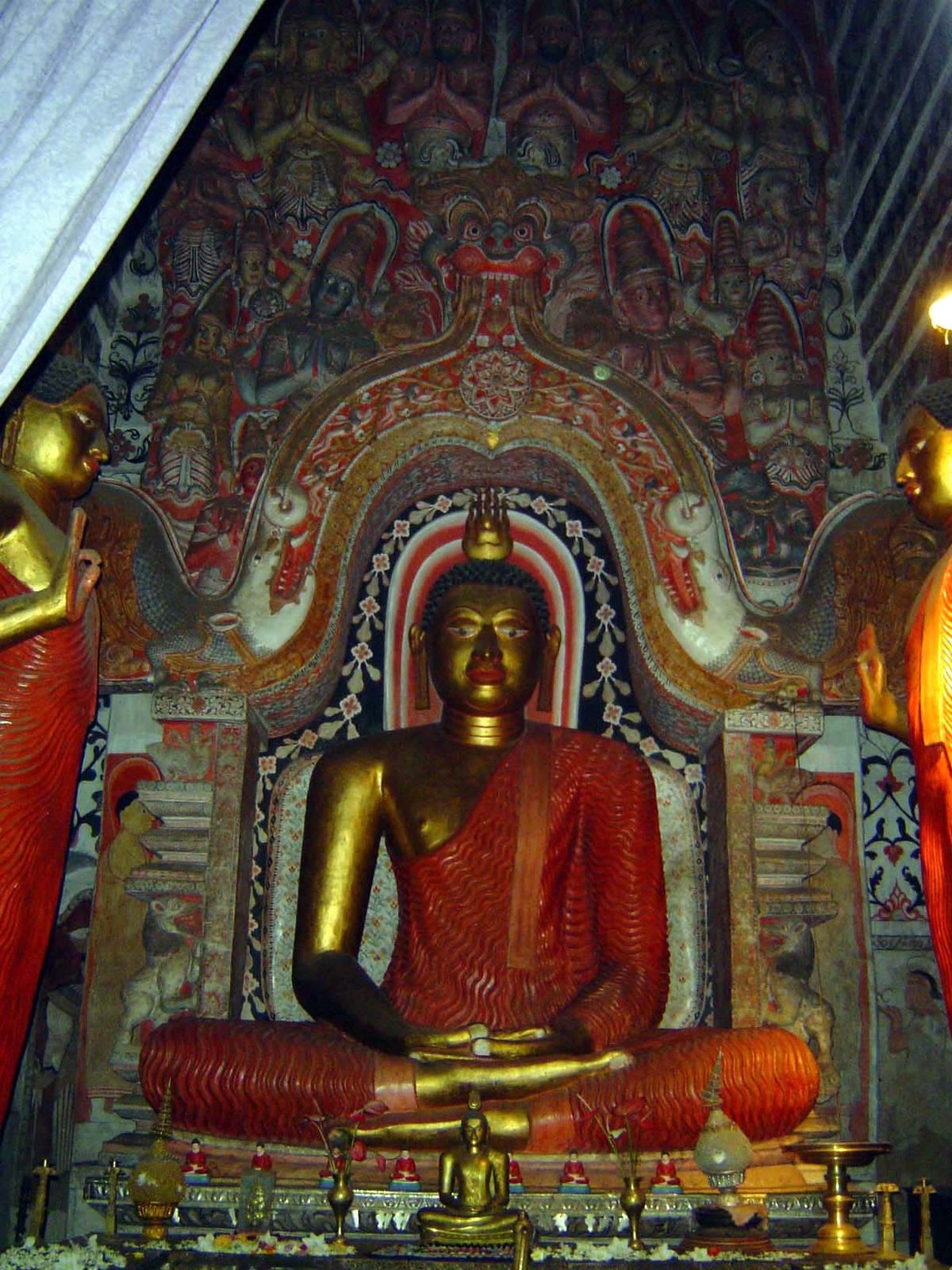 Inside, the Buddha in the dhyana mudra, signifying samadhi, or meditation.