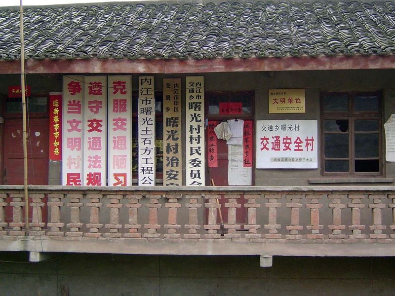 Quite an assortment. The red one on the left says: "May your wishes come true as you welcome the \Chinese New Year." The red signs around th
