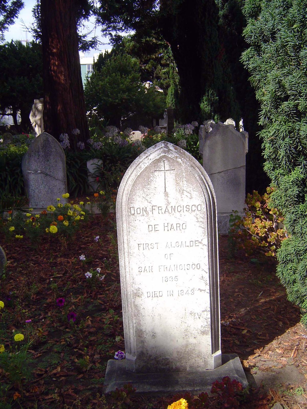 Nor of the mission's cemetery, including the grave of the city's first mayor.