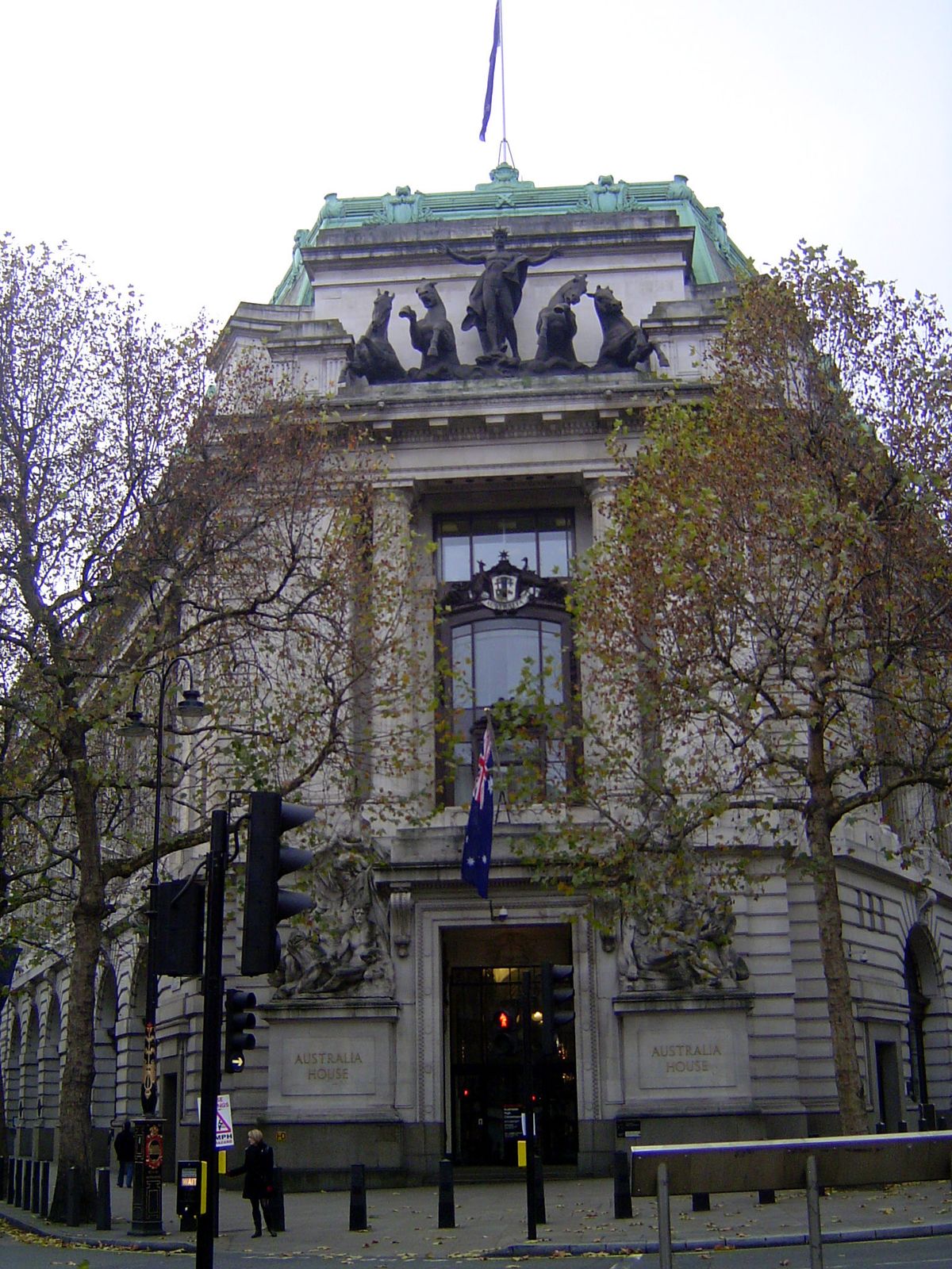 He gets a bit even on rainy days, because the sculptural figures up top are Apollo with the horses of the sun.