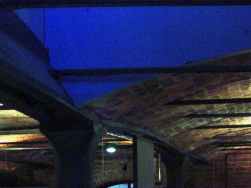 This picture shows more clearly how the brick arches rest against the beams, which are inverted Y-beams, perfectly accommodating the brick.