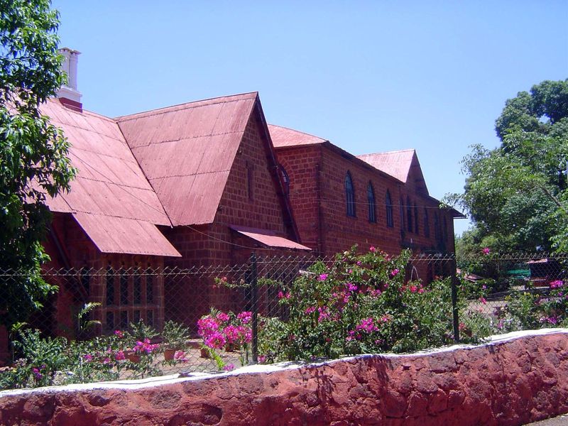 Mahabaleshwar began as Malcolm's army sanitarium. That was 1828. Fifty-some years later, the sanitarium, on the right here, and Bartle Hall,