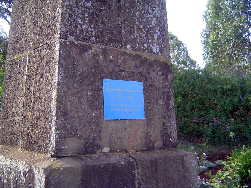 The original plaque was swiped, and the site's owner has replaced it with a simpler one. The inscription is unchanged. The quotation is from