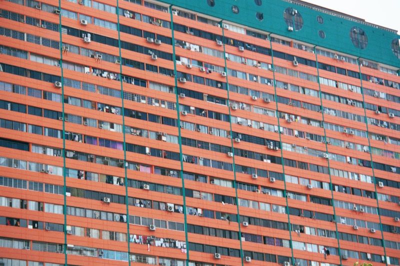 The scale of things grew—by most accounts, too much. Here's an example from Chinatown, near People's Park. A Home Ownership Scheme in 1964 b