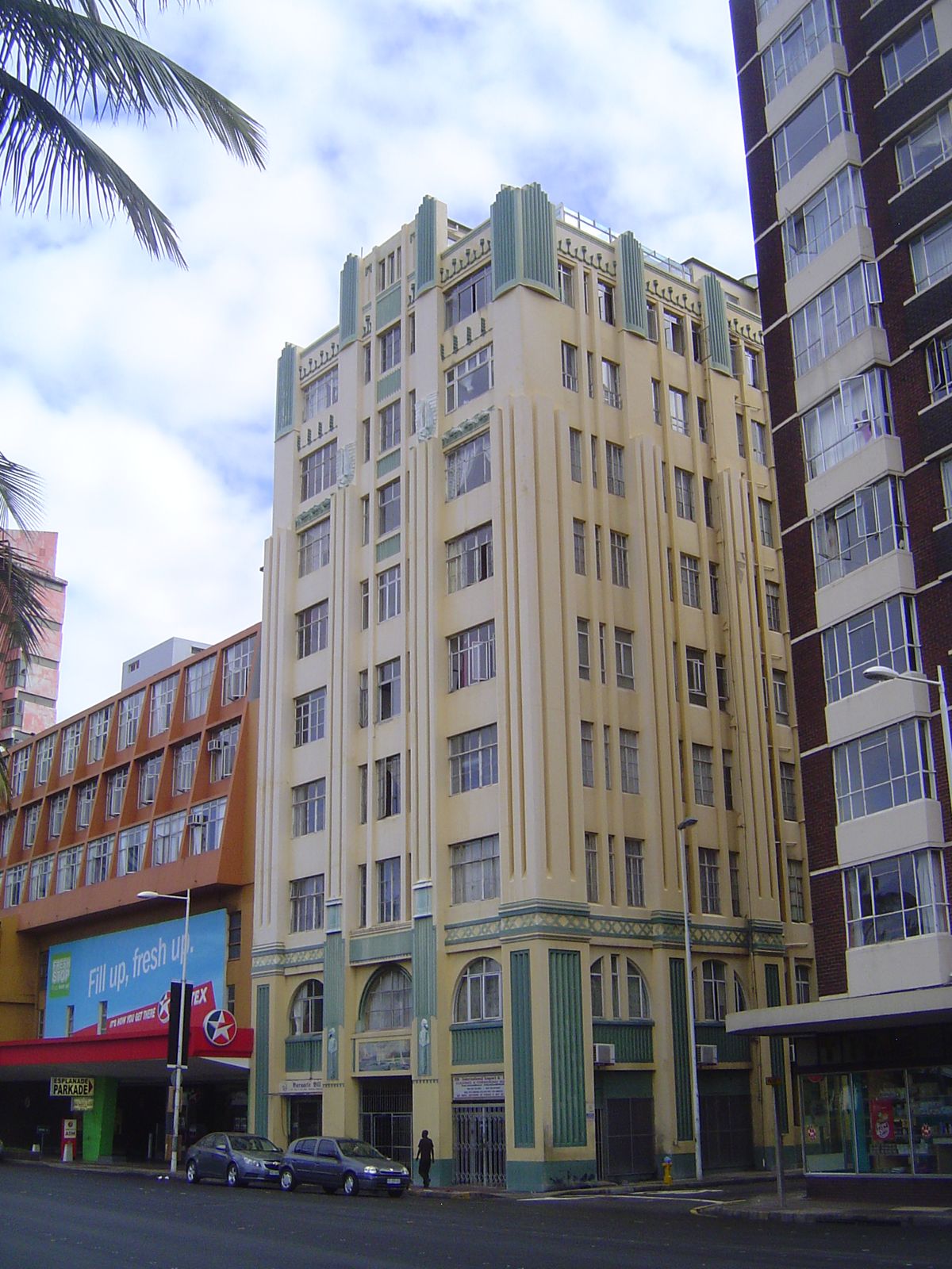 A happier paint job on Victoria Mansions, from 1933.