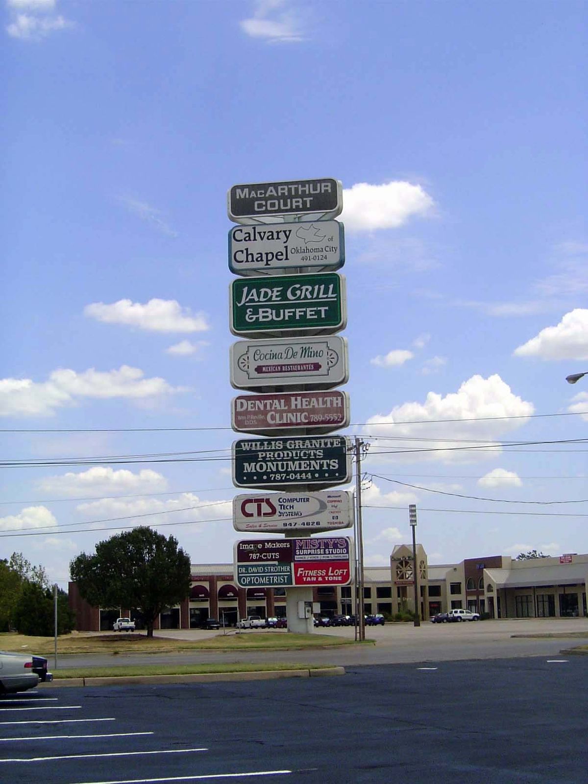 How do you catch the eye of motorists going fast? Here's one answer, at the corner of NW 39th and MacArthur. Despite the massive sign, the t