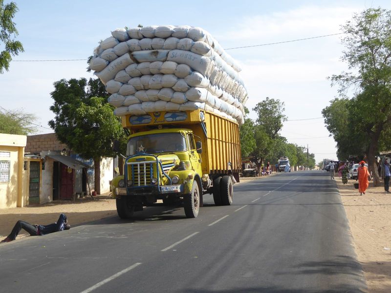 Peanuts have been the big agricultural commodity here for a century. The load seems excessive, but all the trucks are loaded the same way.