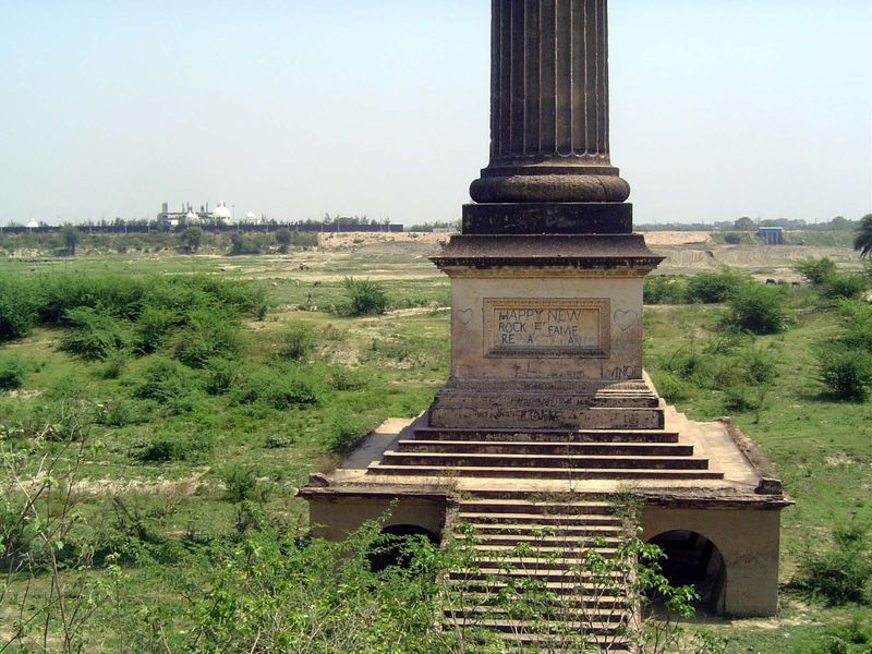 Out in the floodplain of the river, a curious column stands. At one time, it sat in a pond or artificial lake.