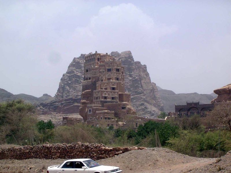 Rub your eyes. Go ahead. Atop a butte eroded to a single shaft, the Imam Yahya, who ruled from 1904 until his assassination in 1948, built t