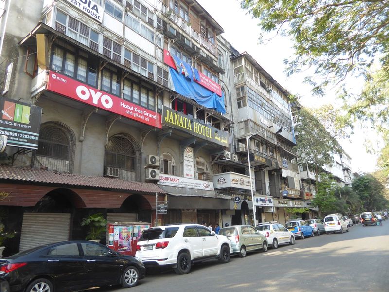 We're pushing south though Colaba. It must be very early in the morning, because the street almost looks peaceful.