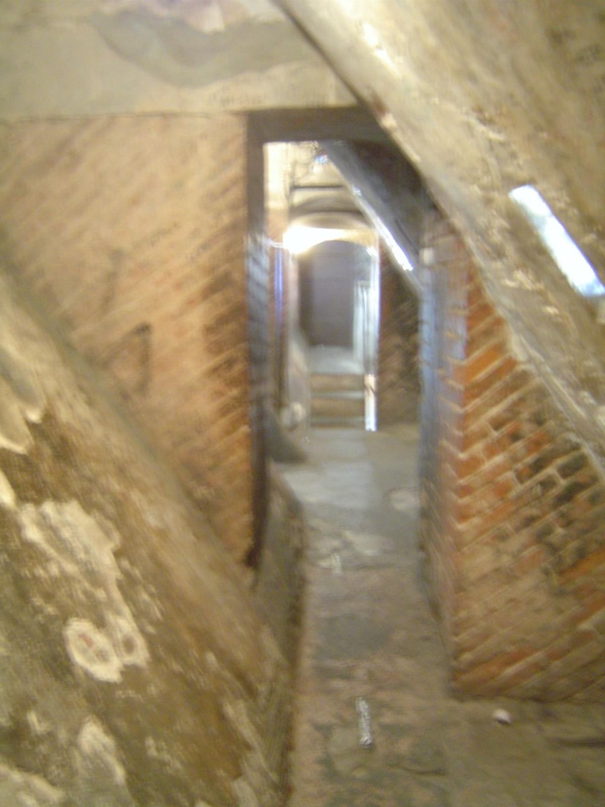 This is an interior walkway at the base of the dome, which begins rising on the left.