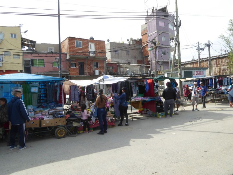 A mobile market set up at one end.