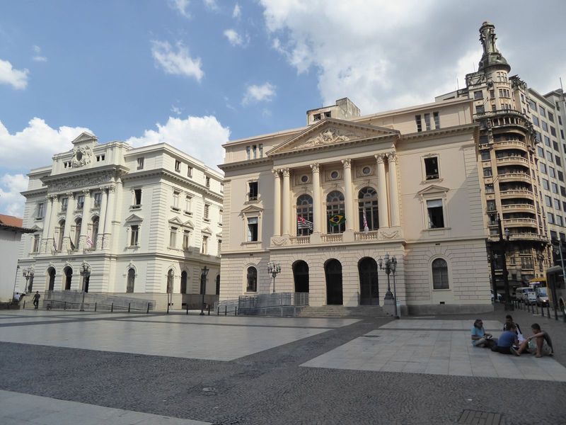 Neoclassical government buildings arrived in the 1890s to house the ministries of agriculture on the left and finance; presently, they're bo