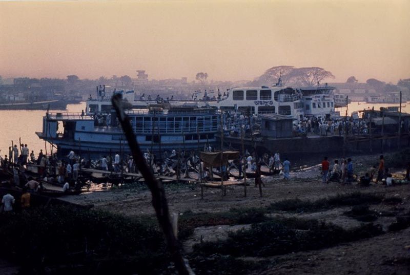 A brighter picture would be false. The air was thick when this picture was taken from Sadarghat Road, formerly Buckland Bund. The ferries ar