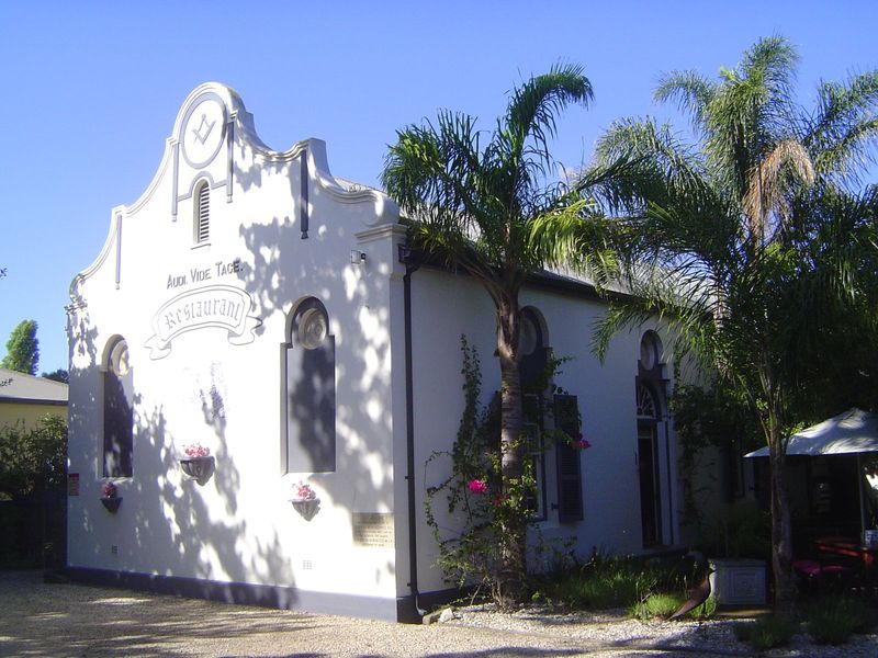 Audi. Vide. Tace. A Masonic motto. The former lodge is now a restaurant.
