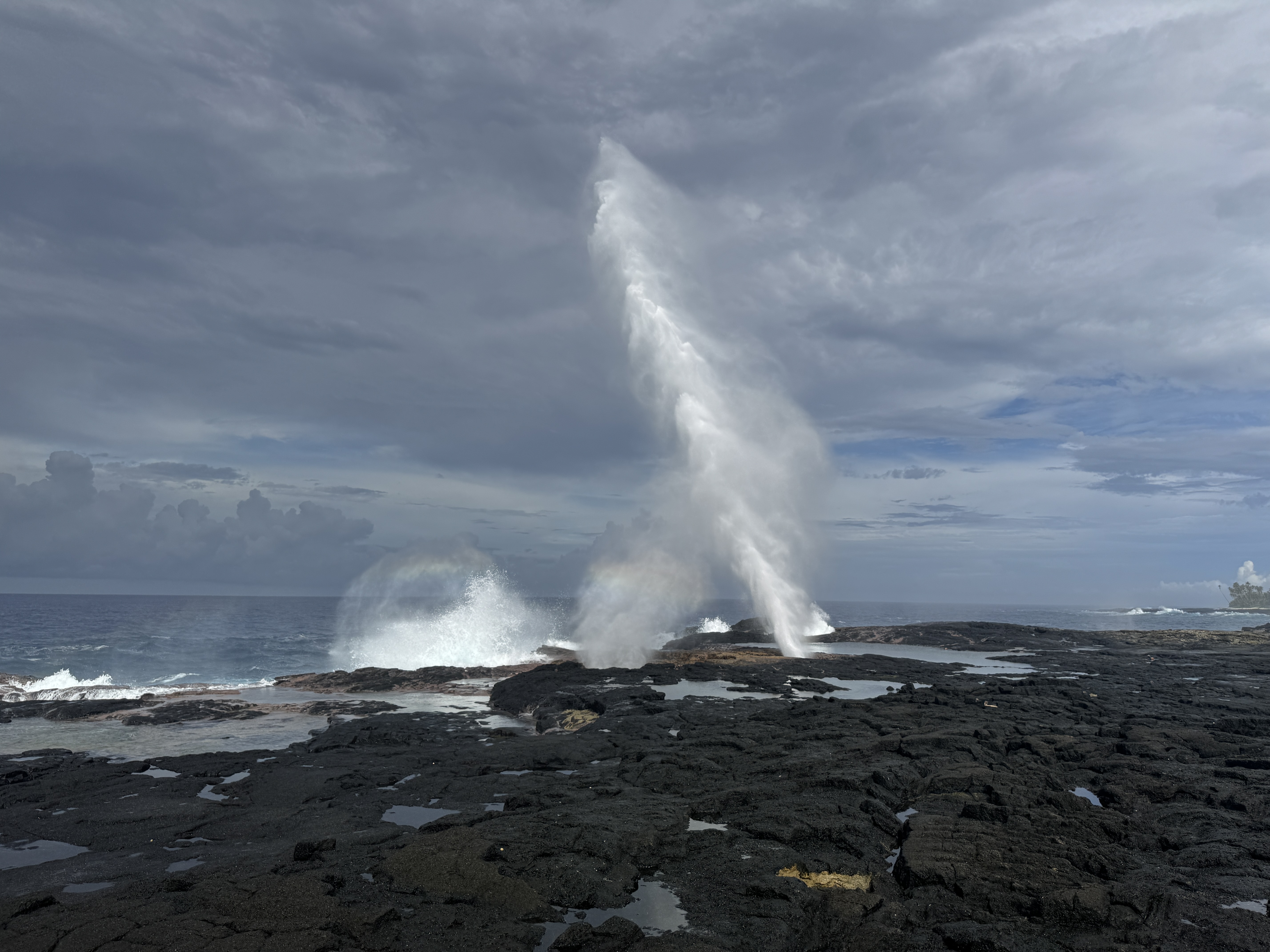 People come chiefly for these geysers, formed when waves enter caves with a hole in the roof.  Every 60 or 90 seconds, boom!