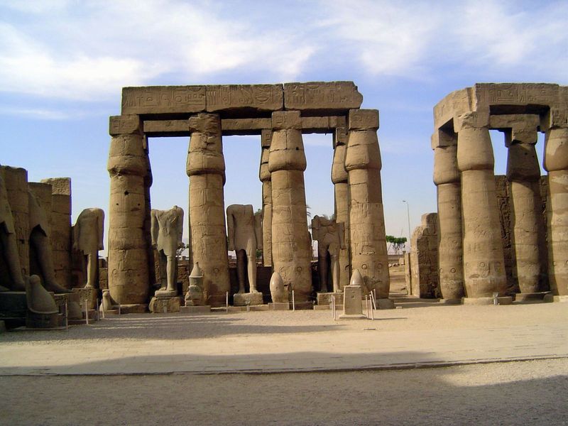 Beyond the pylon: the first great court. The view here is west, toward the Nile.