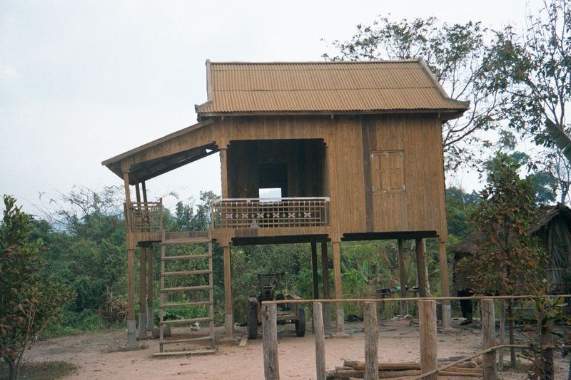 A fancier production, with metal roof, wood walls, and concrete footings. The tinted roof is an nice touch. Down below, more motorized wheel