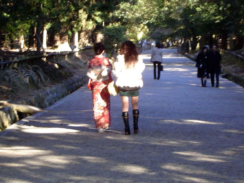 Two friends on their way up to the Kasuga shrine, on the lower slope of Mt. Kasuga. The shrine was founded in 768 by the ancestor of the Fuj