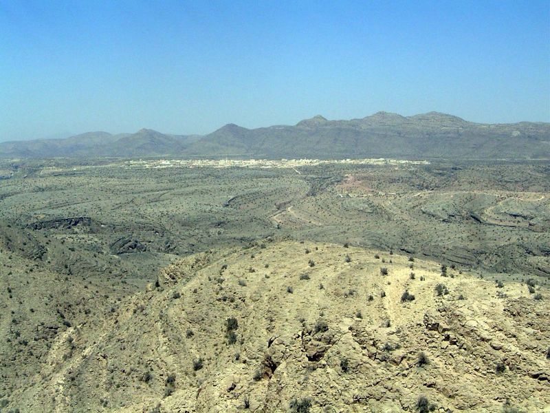 We're pretty much up top now, with the town of Sayq in the distance and the peak called Shams beyond. At 14,000 feet high, it's visible from