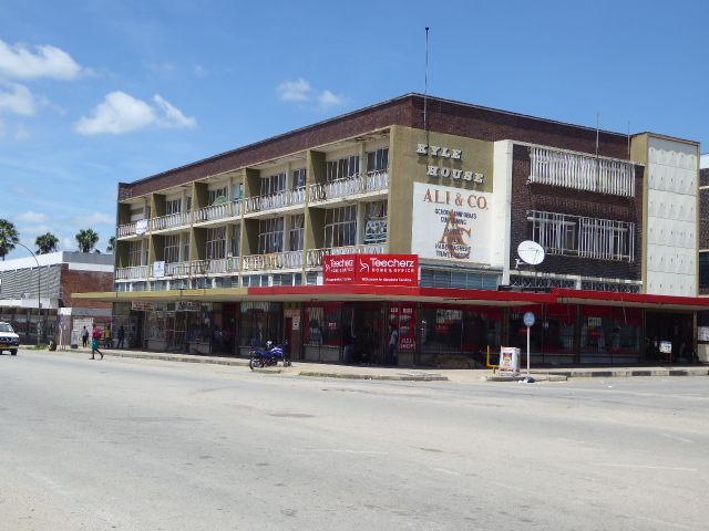 A once-stylish office building carries the name of a nearby reservoir built for sugarcane irrigation.