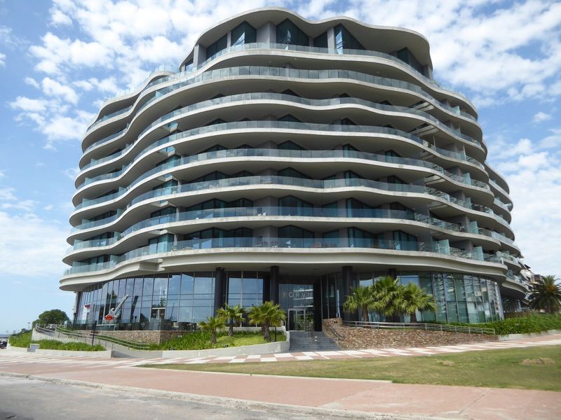 A new neighbor, the Forum Puerto Del Buceo, with apartments starting at just over $200,000 and rising to over a million.
