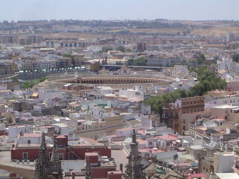 West, to the Plaza de Toros; the Quadalquivir can be glimpsed just behind it, on the left.