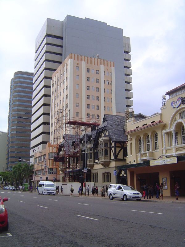 How's this for a lineup? At the far left is the charming Embassy Building, an office block faced with dark, precast concrete. Then there's t