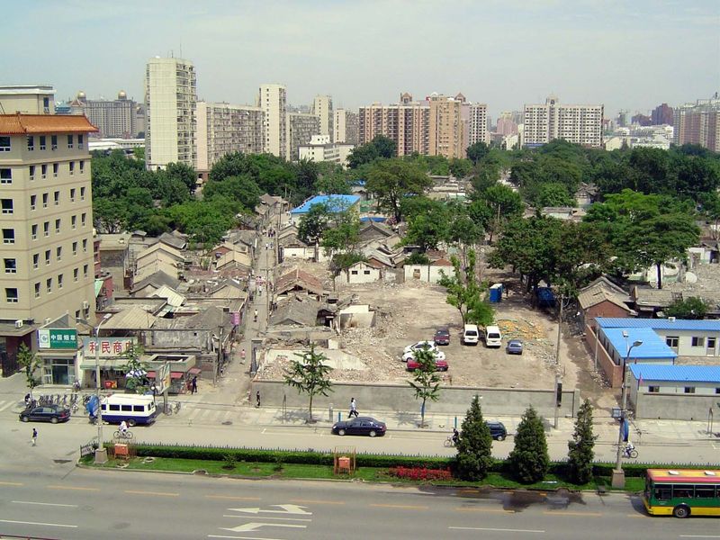 Out with the old! Highrises are not supposed to be built within the Old City, but the rule is flouted. Here, active demolition in 2004.