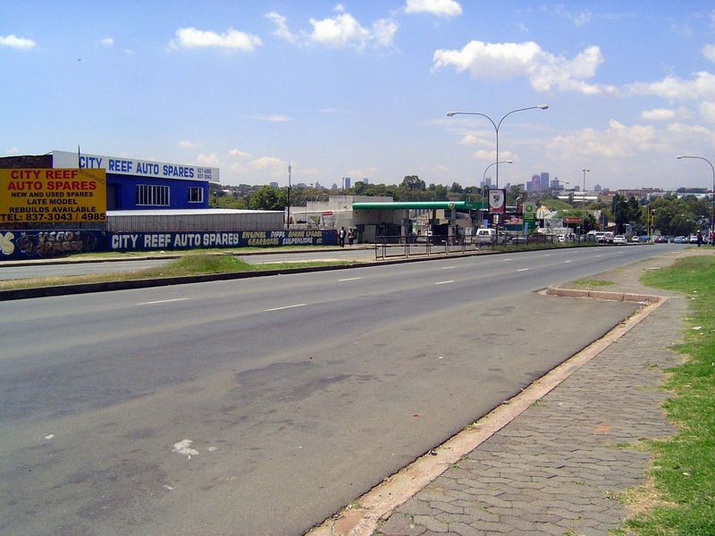 We haven't gone anywhere. We just stepped out of the park for a look at Main Reef Road, which runs into the city as Commissioner Street, lon