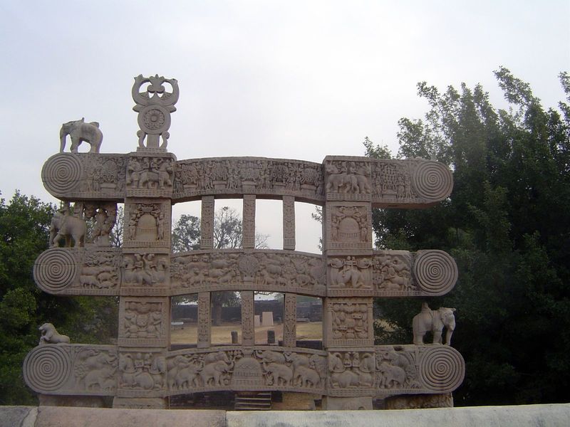 The rear side of the eastern gateway. The top shows in considerable detail the trees associated with the previous buddhas of this eon—acacia