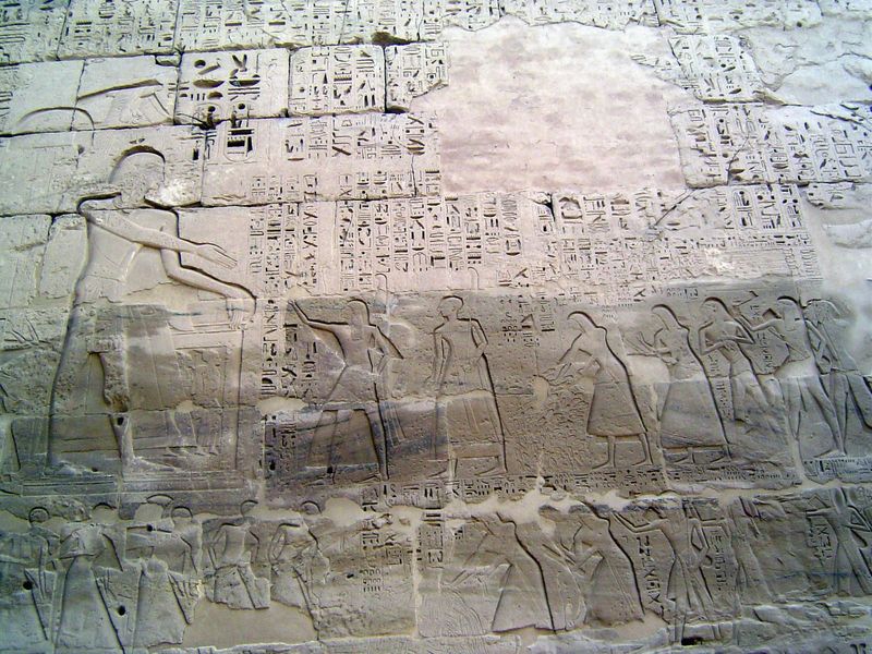 An especially gory panel, with baskets of body parts offered as an accounting of enemy deaths.