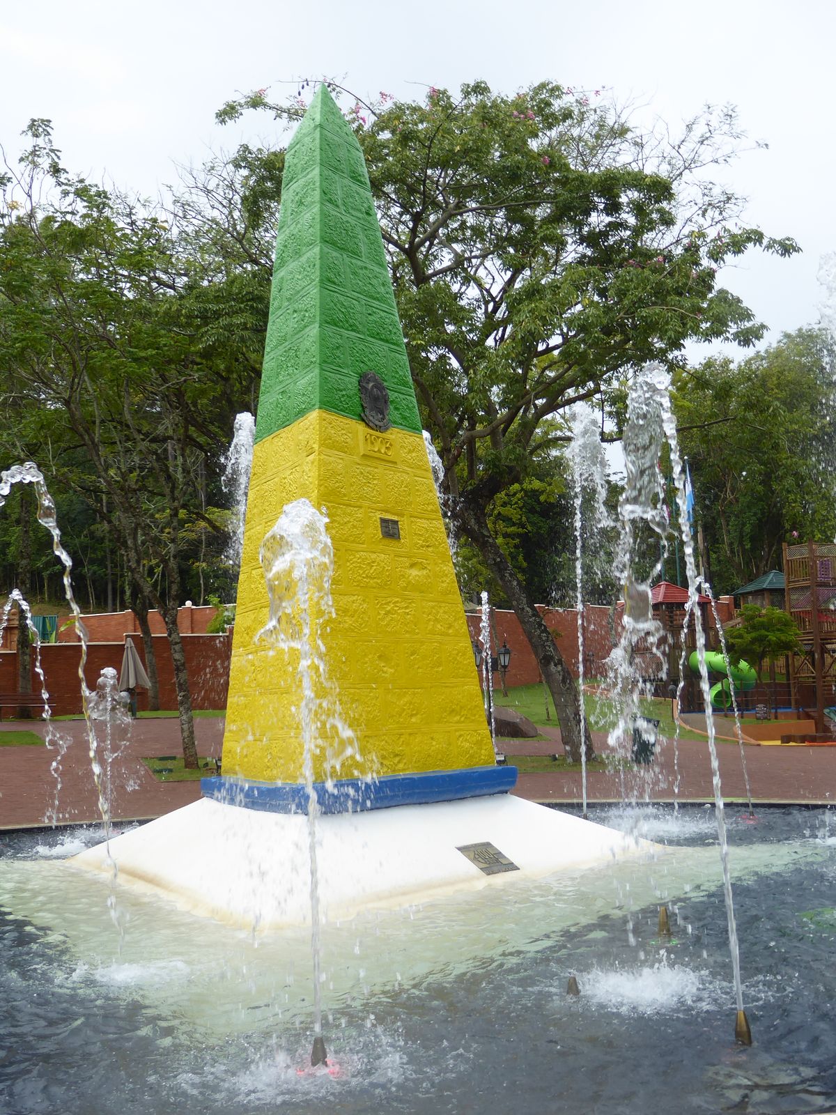 The Brazilians celebrate with an obelisk dated 1903 and painted in the colors of the national flag.