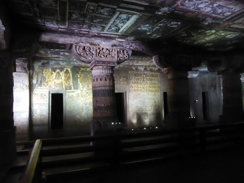 More dalliances on Cave 2's column capitals? The wall painting on the left shows the Buddha in the Tushita Heaven; the one on the right, the