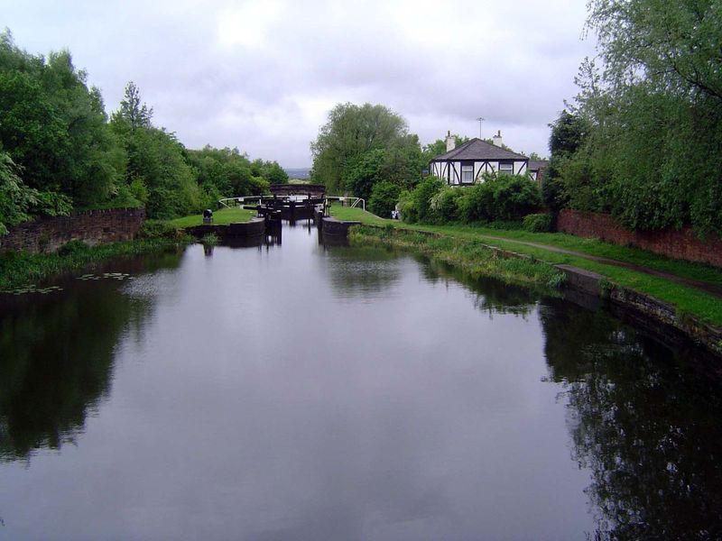 The slope of the canal is steep enough that the space between locks is no more than an oblong pond.