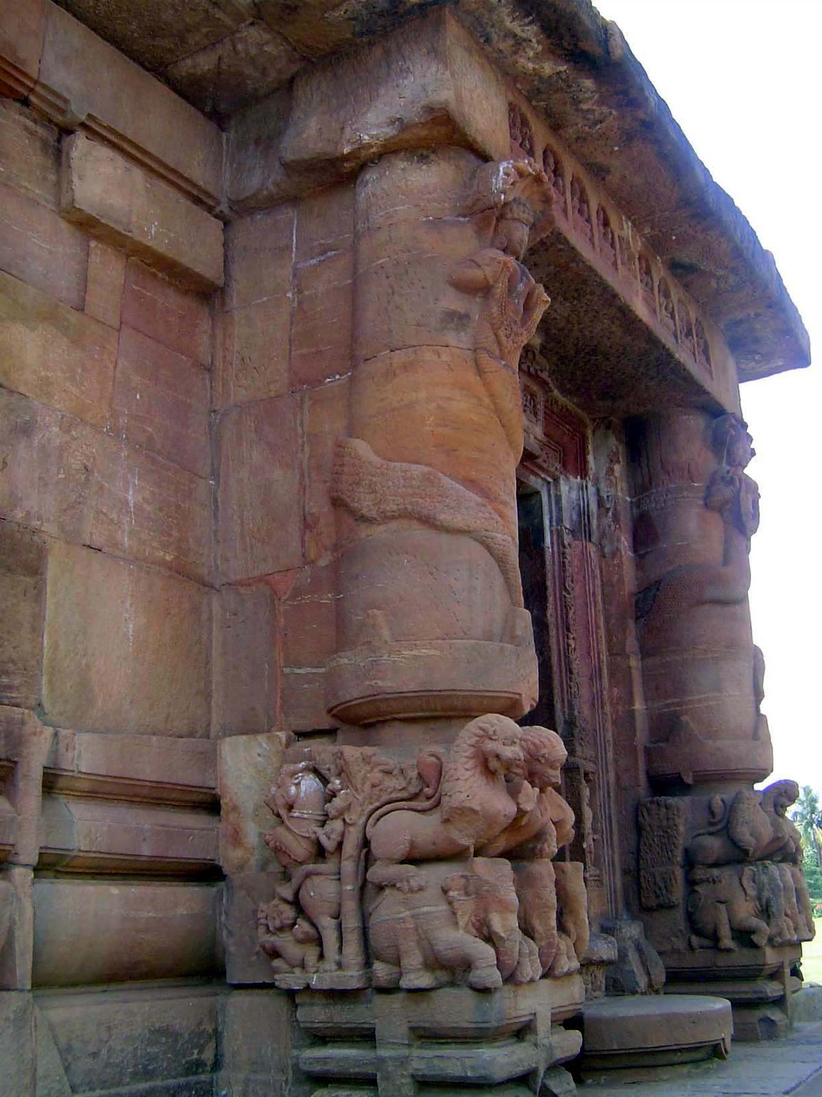 At the base of the columns, lions subdue elephants.