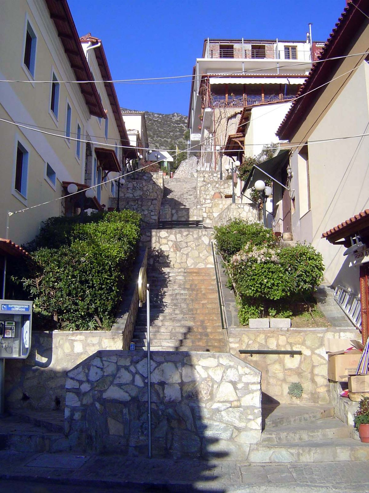 Most of the streets run on the contour. Stairs run up and down the slope.