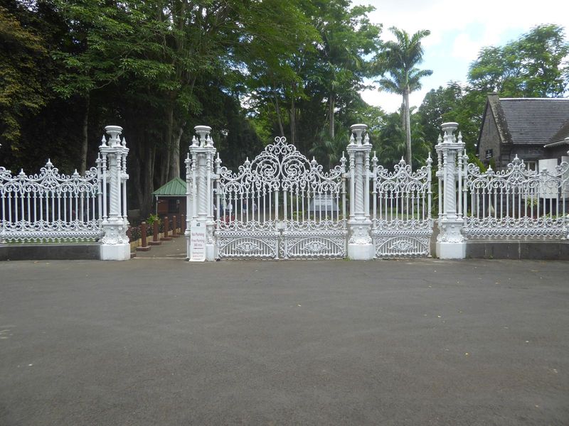 We're on our way north but have detoured a bit to check the Royal Botanical Garden, covering 60 acres at Pamplemousse. The tremendous gates 