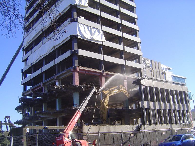 A few days after this photo was taken, the building was imploded. Meantime, water kept the dust down while a "nibbler" did its work.
