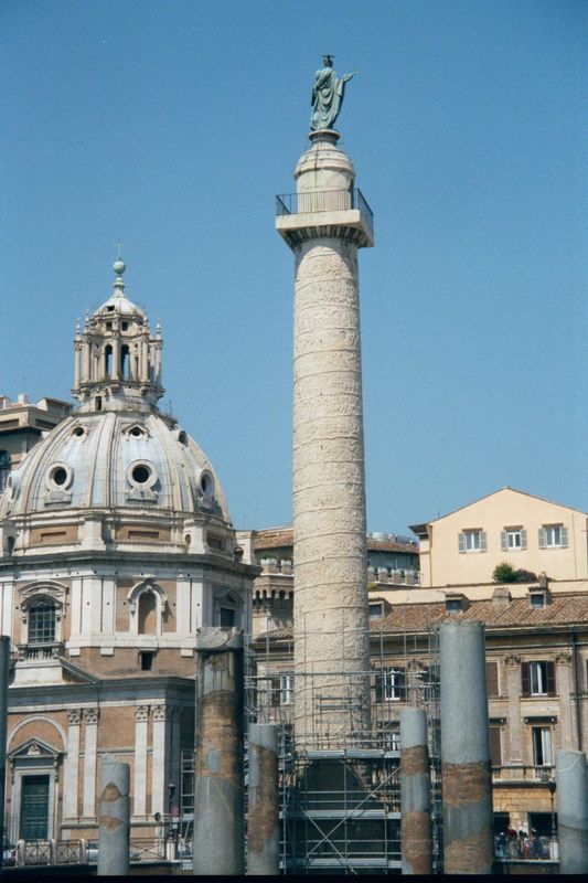 Nearby is Trajan's Column, along with a forest of truncated columns from the Basilica Ulpia. The column consists of 18 marble drums, each ab