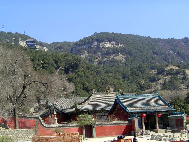 This is Tian Long Shan, Heavenly Dragon Mountain, and the road from Jinci comes over the top about where those power poles are on the skylin