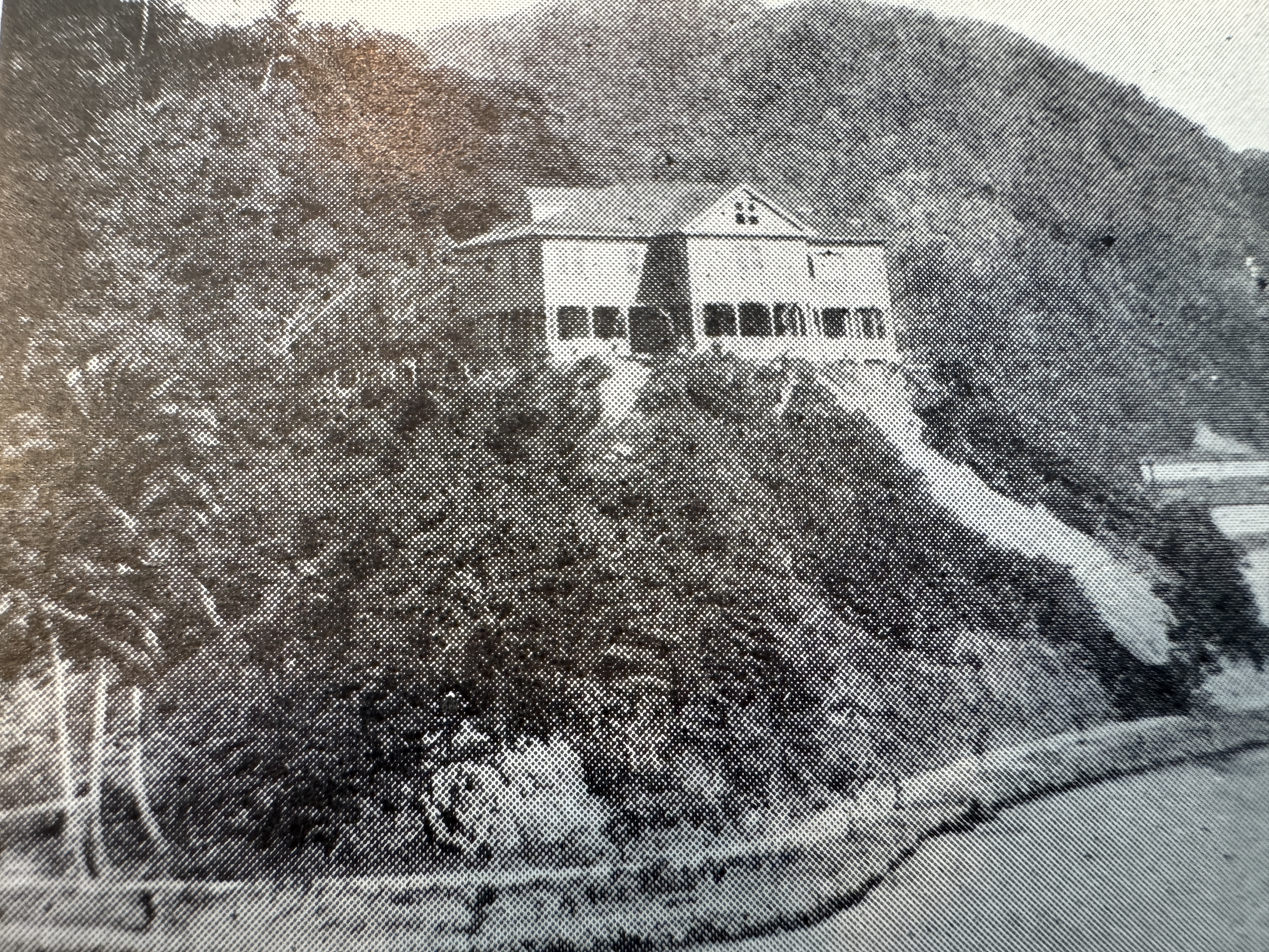 It stood on a hill directly over the docks.  Margery Perham, a guest of the governor, wrote,  "Government House, perched right on the summit