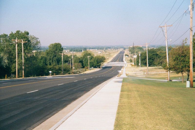 Freshly paved: a section-line road on the northeast side of town. Just itching for houses and traffic. Build it, and they will come.