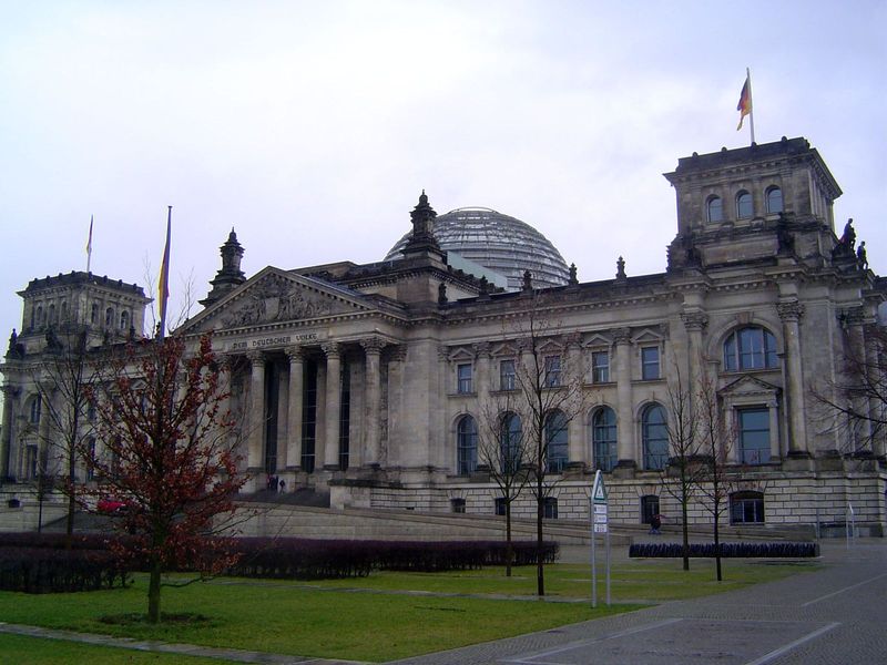 Next door to the Brandenburg Gate, and almost symmetrically placed against the U.S. embassy, this is Germany's parliament, the Reichstag, co